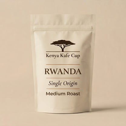Kenya Kafe Cup Rwanda Single Origin Medium Roast coffee bag standing upright on a neutral beige background. Minimalist packaging design with acacia tree logo and refined typography emphasizing origin clarity and balanced roast character.